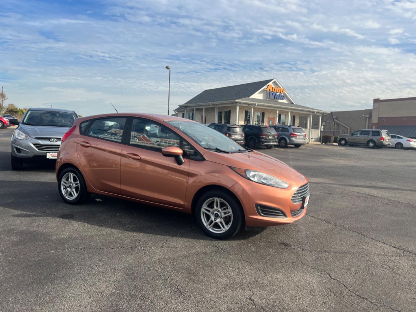 2017 ORANGE Ford Fiesta SE Hatchback (3FADP4EJ0HM) with an 1.6L L4 DOHC 16V engine, located at 420 I-35E, Lancaster, TX, 75146, (469) 297-4144, 32.593929, -96.823685 - Photo#6